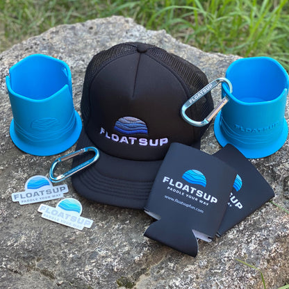 A group of Floatsup branded accessories including a hat, two Floatsup Cups, two Floatsup coozies, and Floatsup stickers of the logo.