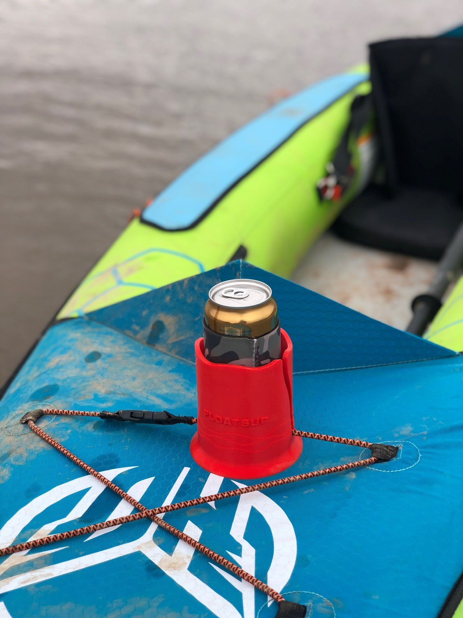 red floatsup cup holder for cans and beverages installed on a kayak